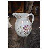 ANTIQUE WATER PITCHER.