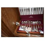 SILVEPLATE FLATWARE SET AND SERVING SPOON .