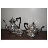 SILVER PLATE TEA SET .