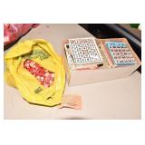 BINGO CARDS AND MARKERS.
