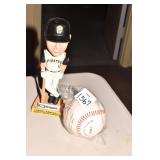 PIRATES STATUE AND BASEBALL.