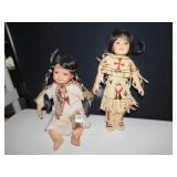 TWO PORCELAIN DOLLS BEADED OUTFITS INDIAN DOLLS