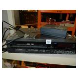 VCR W/ PLASTIC ON TOP AND CHANNEL GUIDE