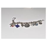STERLING CHARM BRACELET 5 MARKED STERLING CHARMS