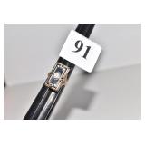 14KT DIAMOND CENTER BLACK ENAMELED BACK