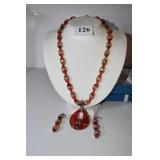 RED BEAD NECKLACE 20" W/ FLOWERS MOTIF INSIDE THE