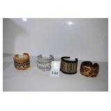 FOUR BEADED CUFF AND OTHER BRACELETS