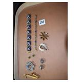 BRACELETS, PINS EARRINGS, HORN, PINS, ETC.