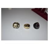 GOLD TONE RING SZ. 9, 9.25 RING SZ. 8 ON LEFT AND