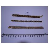 FOUR GOLD TONE LINK BRACELETS ONE JOAN RIVERS