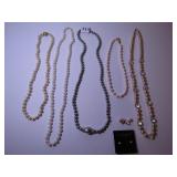 FIVE STRANDS PEARL NECKLACES ONE NOLAN MILLER,