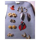 NINE PAIRS OF EARRINGS