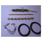 GROUP OF SIX LADIES BRACELETS GOLD TONE LINK,