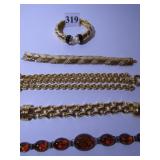 FIVE LADIES BRACELETS, GOLD TONE METAL CUFF,