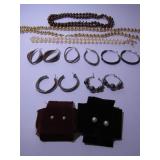 SEVEN PAIRS OF EARRINGS AND THREE STRANDS OF