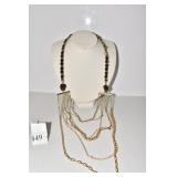 SEVEN STRAND GOLD TONE WITH BRASS WRAPPED