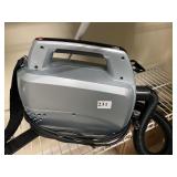 PORTABLE VAC W/ LONG HOSE.