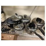 SAUCE POTS W/ LIDS USED.