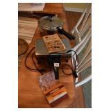 PRESSURE COOKER AND PIZZELLE MAKER