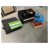 RC 50 SLIDE CUBE PROJECTOR BY BELL AND HOWELL AND