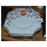 4 HAND PAINTED LUNCHEON PLATES