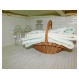3 GLASS CANISTERS AND BASKET WITH TOWELS