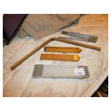 WOOD RULERS W/ BRASS TRIM AND ONE METAL RULER