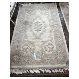 WOOL AREA RUG 59" X 102 - CREAM BACKGROUND