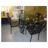 IRON GLASS OVAL TOP TABLE 65"L 40"W 30"H 6 CHAIRS