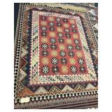 107X74 MACHINE MADE AREA RUG WITH SOUTHWEST MOTIF