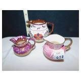 3 SMALL CREAMERS/ PITCHERS WITH GOLD ACCENTS,