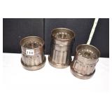 THREE METAL CANDLE STANDS