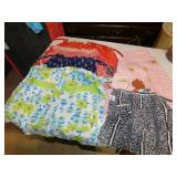 GROUP OF HALF APRONS AND CHILDS SMOCK