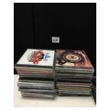 BOX OF CDS INCLUDING ALABAMA, ABBA AND RANDY