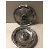 TWO RIMS ONE BUICK REGAL AND A MERCURY COUGAR RIM