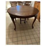 ANTIQUE 48" ROUND OAK TABLE AND 2 12" WIDE LEAVES