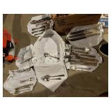 SET OF SILVERWARE IN HOLDERS