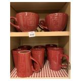 7 TEMPTATION MUGS AND 4 SOUP BOWLS