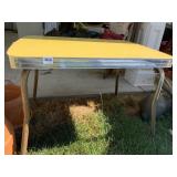 YELLOW FORMICA TOP CHILDS TABLE, BANDED SIDES,