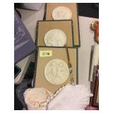 CHERUB PLAQUES, LETTER OPENER AND DOILIES