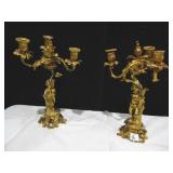 PAIR OF CHERUB BASE HOLDING A TWISTING VINE