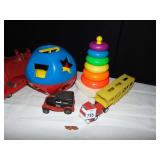 SHAPE SORTER, STACKING TOY, TOOSIE TOY TRUCK,