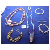 NECKLACE WITH WOOD BEADS, FOUR BRACELETS,