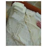 LARGE ASSORTMENT OF DRESSER SCARVES, TOPPERS,