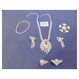 RHINESTONE NECKLACE WITH RED STONE PENDANT,