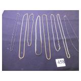 GROUP OF EIGHT CHAIN NECKLACES A COUPLE ARE
