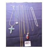 GROUP OF SEVEN CHAIN NECKLACES SOME WITH PENDANTS