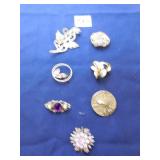 GROUP OF SEVEN PINS BROOCHES GOLD TONE