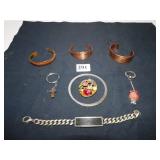 THREE COPPER BRACELETS, TWO KEYCHAINS ONE WITH