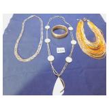 MULTISTRAND ORANGE BEADED NECKLACE WOVEN SILVER